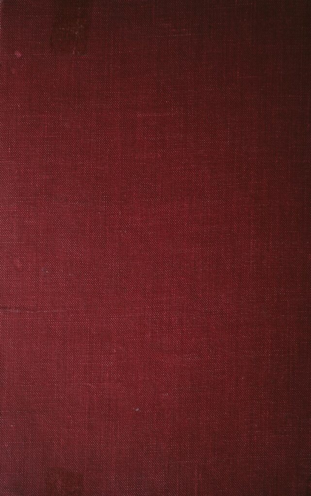 a close up of a red book cover